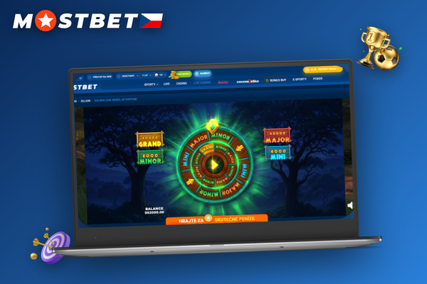 Mostbet tipy: ruka odsouvá notebook s upozorněním na denní limit sázek